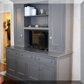 F74. Custom build gray cupboard. 